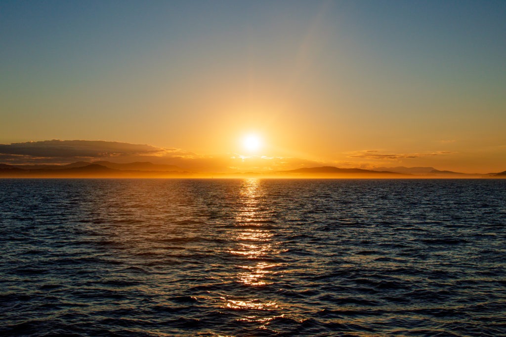 Dusk Over the Misty Peaks off the Coast of BC